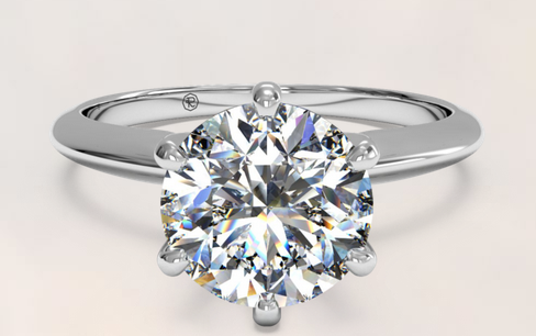 Cubic Zirconia Engagement Ring- A Round Cut Solitaire with Straight Edge Prongs