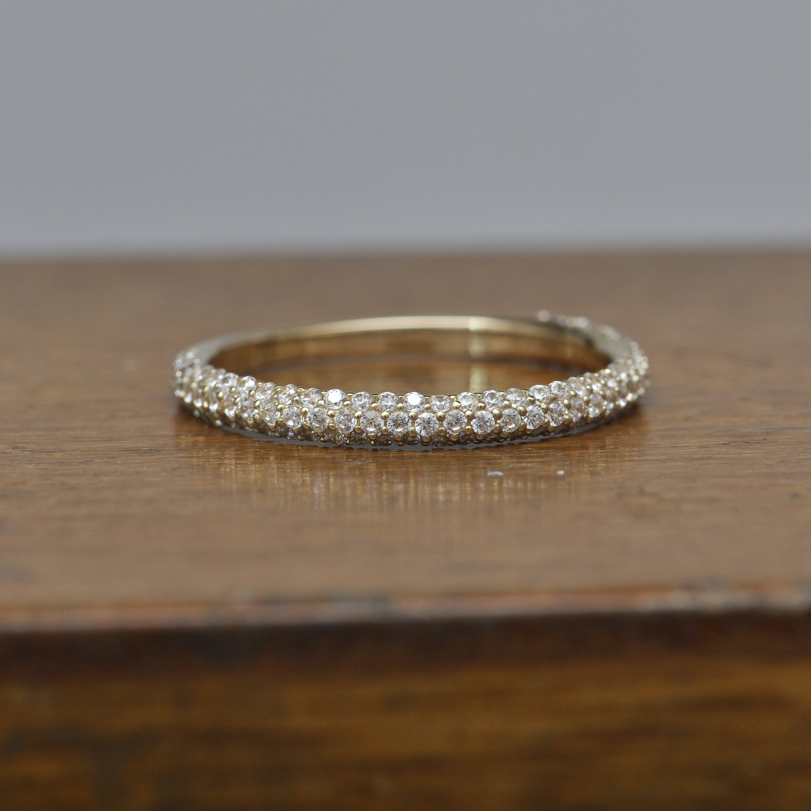 Cubic Zirconia Anniversary Ring Band, *Clearance* Style 04-20 (0.60 TCW Round Pave Band in 10K Yellow Gold)